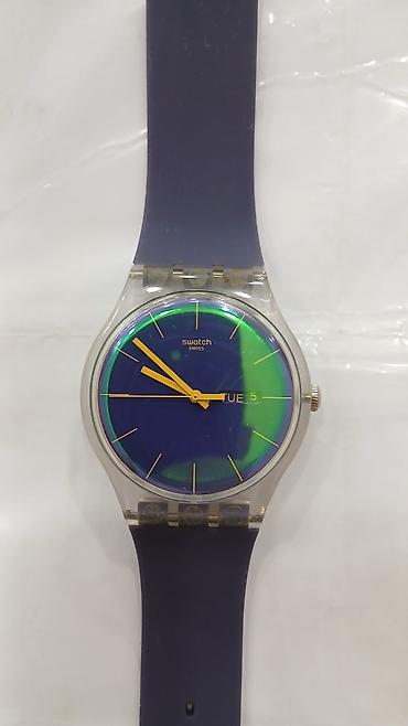 klassik saatlar: İşlənmiş, Qol saatı, Swatch, rəng - Bənövşəyi — 2