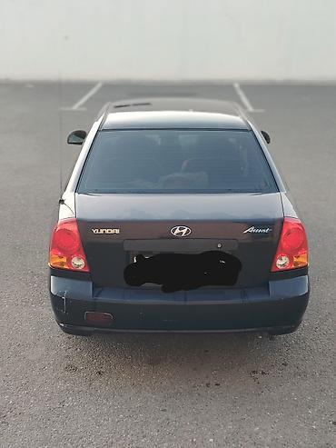 disk masin: Hyundai Accent sedan - Kuzov: 4 qapılı sedan, tünd mavi rəng - — 5
