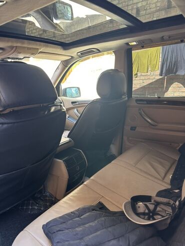 мошина: BMW X5 (E53), серый металлик, кузов SUV. Особенности и комплектация