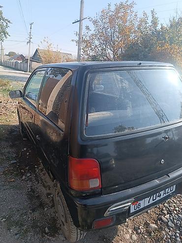 mersedes 212: Daihatsu Cuore: 1994 г., Механика, Бензин, Хэтчбэк — 3