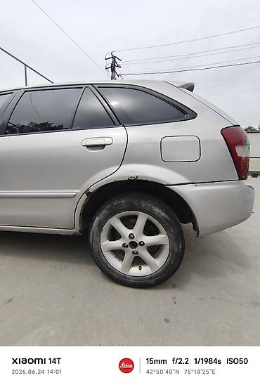 e53 amg: Mazda Familia: 2001 г., Универсал — 3