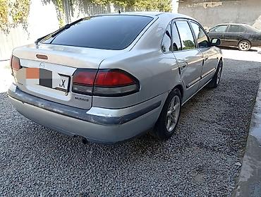 легкий карфакс: Mazda 626: 1998 г., 1.8 л, Механика, Бензин, Хэтчбэк — 3
