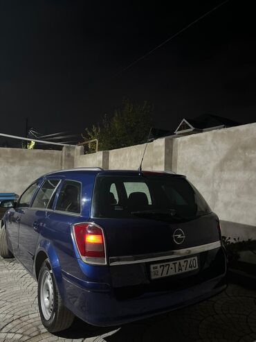 Opel: Opel Astra H Caravan (universal), göy rəng. - Kuzov: universal — 16