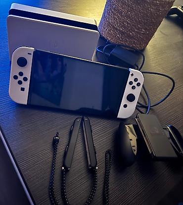 Nintendo Switch: Nintendo Switch Oled. Ag rengde. Bir nece aydir almisham, cox az — 1
