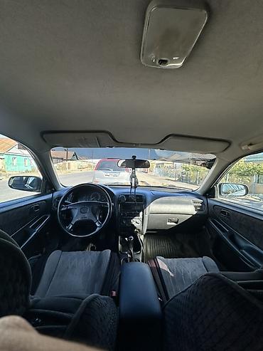 fix look: Mazda 626: 1998 г., 2 л, Механика, Бензин, Хэтчбэк — 5