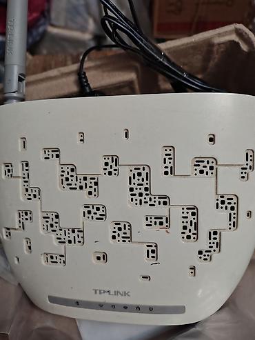 balaca printer: TP-Link simsiz marşrutlaşdırıcı + Pirelli PRG A1010 modem Məhsul — 1