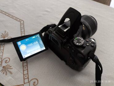 KAMERA: Nikon D5100 DSLR fotoaparat (28-55mm lens, batareya, 16GB