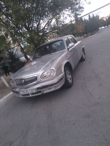 volqa matoru: GAZ-3110 Volga sedan - Kuzov: 4 qapılı sedan, gümüşü rəng - Mühərrik