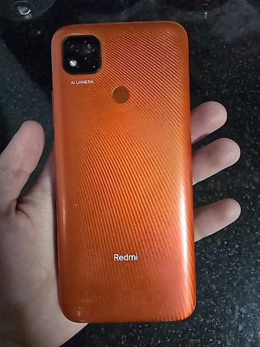 Техника и электроника: Смартфон Redmi (оранжевый) - Корпус: яркая оранжевая спинка с — 1