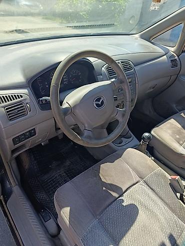 210 миллениум: Mazda PREMACY: 2000 г., 1.8 л, Механика, Бензин, Минивэн — 7