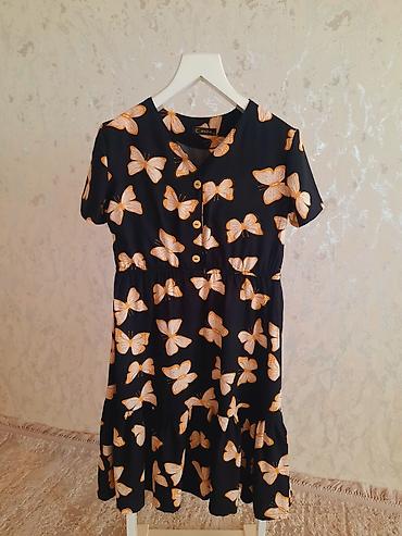 Futbolka və maykalar: Məhsul: 2 ədəd qadın bluz/don üstü 1) Kobalt mavi, güllü naxışlı — 15