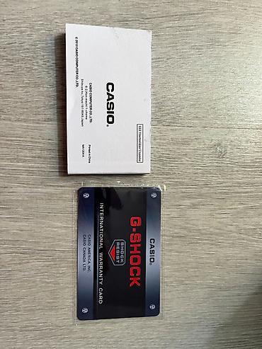 romanson satovi cena: Casio G-Shock ručni sat u beloj boji, sa prepoznatljivim robusnim — 4