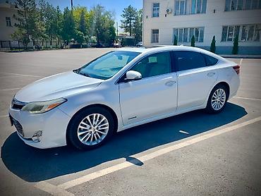 динамики камри: Toyota Avalon: 2015 г., 2.5 л, Вариатор, Гибрид, Седан — 4