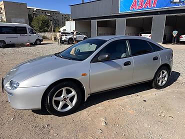 мазда демио диска: Mazda Lantis: 1998 г., Механика, Бензин, Хэтчбэк — 3