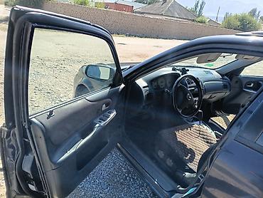 бишкек авто салон: Mazda 323: 2002 г., 2 л, Автомат, Бензин, Хетчбек — 6