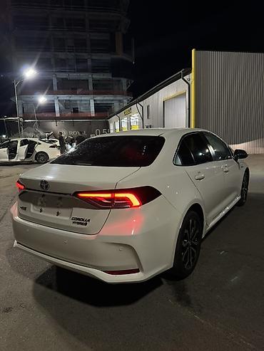 byd e1: Toyota Corolla: 2022 г., 1.8 л, Автомат, Гибрид, Седан — 4