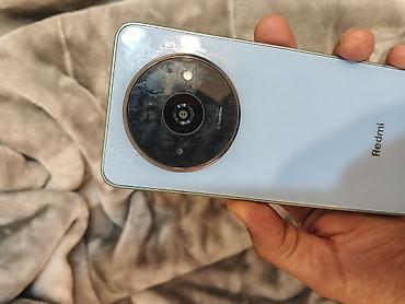 diş: Redmi smartfon - Model: Redmi (dairəvi kamera moduluna sahib “AI — 1