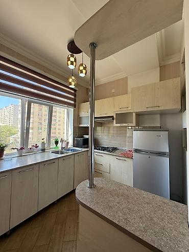 Yeni tikili: Mərkəzdə Kupçalı Əşyalı 3 Otaga Düzəlmə Mənzil. 63 Kv 128 Min. 16 — 12