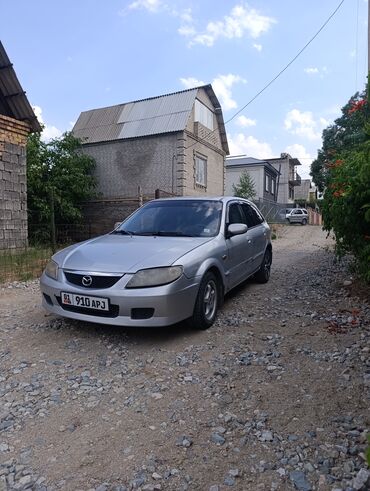 крыло виндом: Mazda 323: 2002 г., 1.6 л, Механика, Бензин, Хэтчбэк