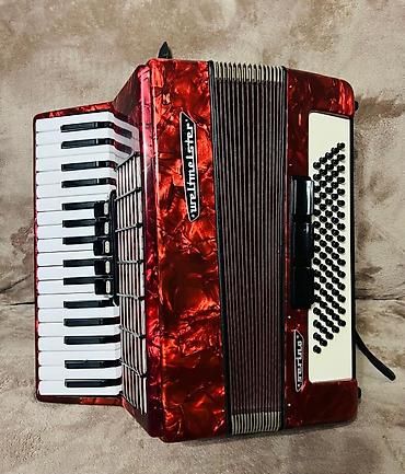 Аккордеоны: Аккордеон Weltmeister (кнопочно-клавишный), красный перламутровый — 10