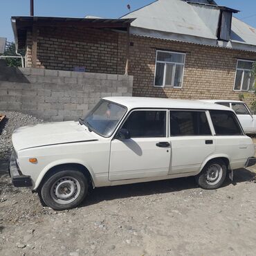 ВАЗ (ЛАДА): Автомобиль ВАЗ 2104, кузов универсал, белого цвета. Эта модель