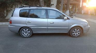 ford focus 2000: Kia Carens: 2 l | 2003 il Van/Minivan — 4