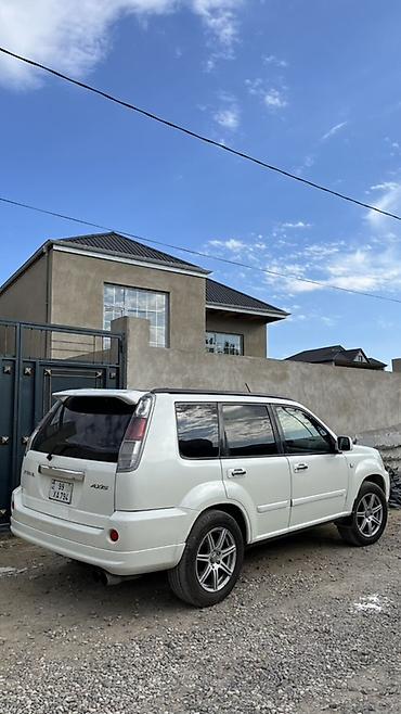 opel astra 1994: Nissan X-Trail: 2 l | 2004 il Krossover — 2