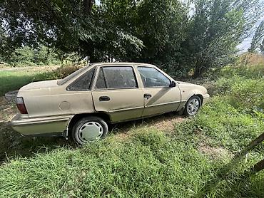 тирактир 80: Daewoo Nexia: 2006 г., Седан — 1