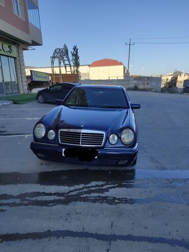 Mercedes-Benz E 200: 2 л | 1997 г. Седан