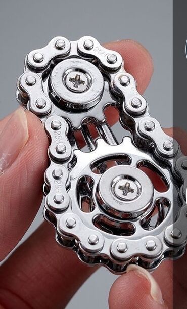 Игрушки: Небольшой спиннер из металла, выполненный в виде велосипедной цепи — 9