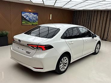 crown 2004: Toyota Corolla: 2022 г., 1.8 л, Автомат, Гибрид, Седан — 2
