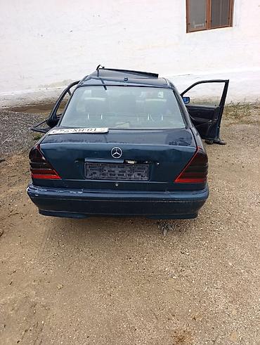 daewoo nexia 2005: Mercedes-Benz C 180: 1.8 l | 1998 il Sedan — 1