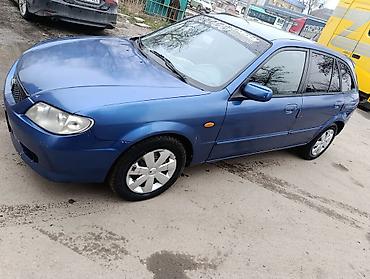 Mazda: Mazda 323: 2002 г., 1.6 л, Механика, Бензин, Хэтчбэк — 7