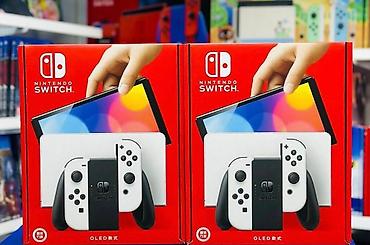 Nintendo Switch OLED (ağ dok + ağ Joy‑Con) - 7.0 düymlük OLED ekran