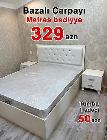 taxt doşəyi: Bazalı çarpayı – zərif ağ rəngdə, yumşaq, düyməli başlıqla. Bazası — 1