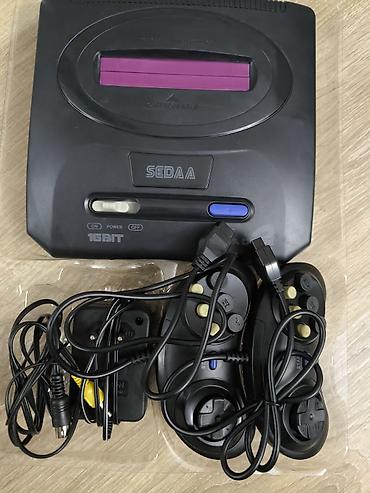 sega mega drive: SEDA 16-bit video oyun konsolu. Komplektə konsol, 2 ədəd pult, enerji — 1