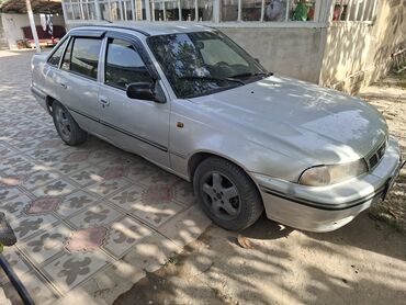 тойота королла гибрид бишкек: Серебристый седан Daewoo Nexia с четырьмя дверями и пятью посадочными