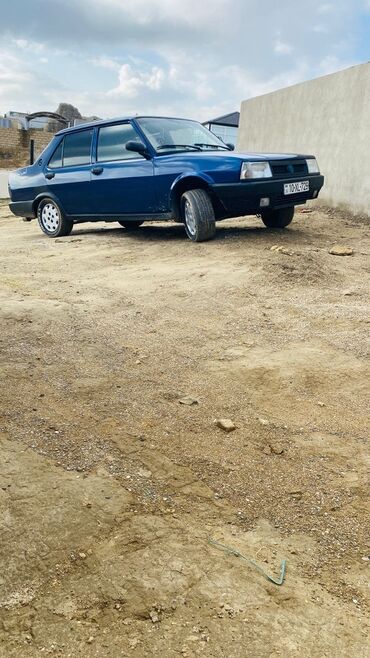 Tofas: Model: Tofas Şahin (sedan) Kuzov: 4 qapı, mavi rəng Yanacaq: Benzin -da lalafo.az — 1 Tofas: Model: Tofas Şahin (sedan) Kuzov: 4 qapı, mavi rəng Yanacaq: Benzin — 1