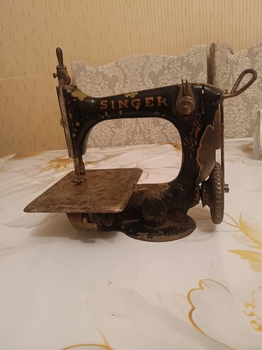 nerd taxta qiymeti: Məhsul: Singer markalı mexaniki tikiş maşını (köhnə model)