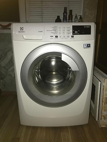 electrolux eohm6221: Paltaryuyan maşın Electrolux, 8 kq, Yeni, Avtomat, Qurutma var, Ünvandan götürmə — 1