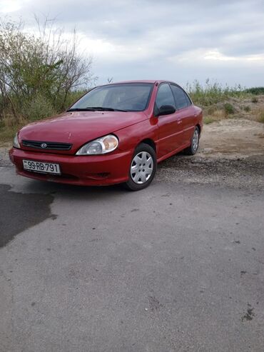 kia volkswagen: Kia Rio: 1.5 l | 2002 il Sedan