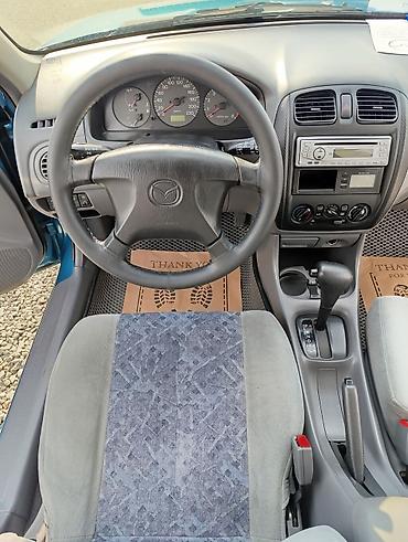 mazda авто: Mazda 323: 1999 г., 1.5 л, Автомат, Бензин, Универсал — 8