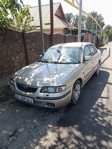 2107 2011: Mazda 626: 1997 г., 2 л, Автомат, Бензин, Седан — 1