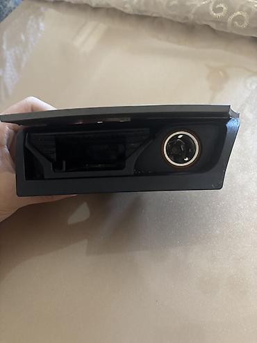 orta panel: OPEL ASTRA mərkəzi konsol külqabısı və çaxmaqdaş yuvası (12V siqaret — 2