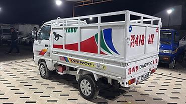 Транспорт: Daewoo Labo бортовой грузовик с высоким каркасом кузова. Компактный — 1