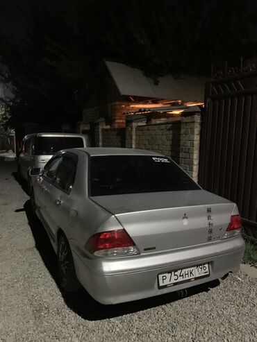 Mitsubishi: Mitsubishi Lancer: 2001 г., 1.5 л, Автомат, Бензин, Седан