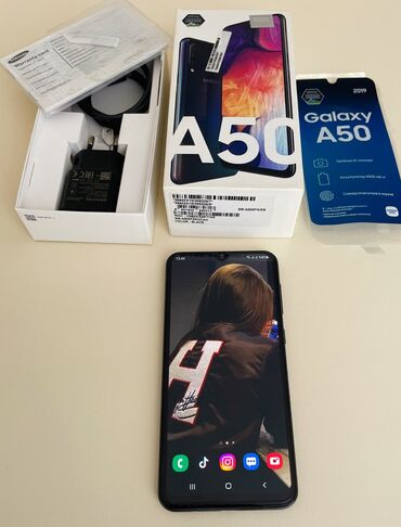 telefon nomreleri: Samsung Galaxy A50, 64 ГБ, цвет - Черный, Отпечаток пальца, Две SIM карты, Face ID