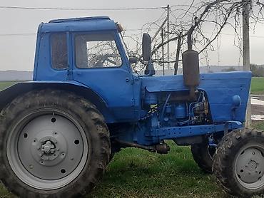 авто азербайджан: Mavi rəngdə kabinəli kənd təsərrüfatı traktoru. Xüsusiyyətlər: - — 2