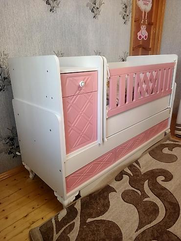 Beşiklər: Uşaq beşiyi – “Melek Bebe” modellidir. Ağ-çəhrayı rəng çaları ilə — 2