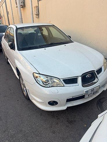 kovş: Subaru Impreza: 2 l | 2007 il 301000 km Sedan — 2
